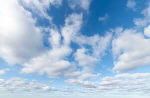 bright blue sky with fluffy white clouds