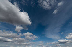 deep blue sky with white clouds