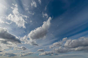 daytime sky with different white clouds