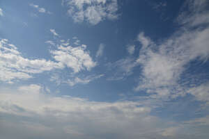 daytime sky with medium amount of white clouds