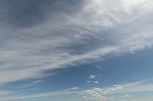 daytime sky with thin cirrus clouds