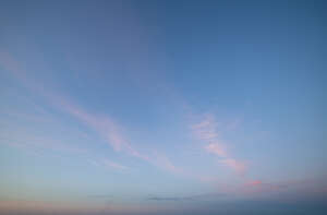 evening sky with few pink clouds