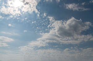 daytime pale sky with thin clouds