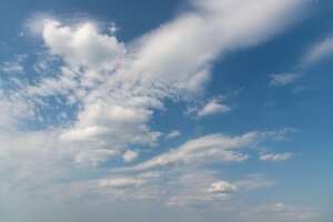 classical daytime sky with some clouds