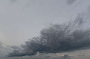 sky with large dark grey cloud