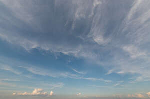 daytime sky with thin layer of clouds