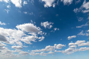 daytime sky with some white clouds
