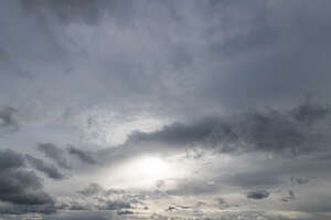 sky covered with thin grey clouds