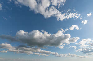 daytime sky with classical white clouds