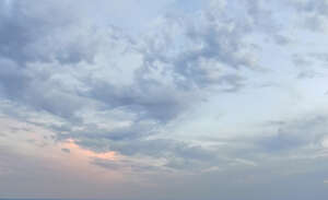 evening sky with light clouds and pink colours