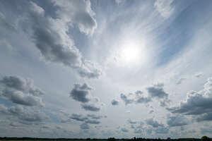 sky with sun and thin clouds