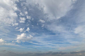 pale blue sky with thin clouds