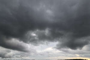 dark grey stormy sky at sunset