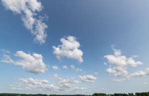 blue sky with small white clouds