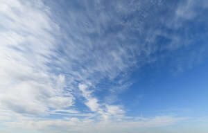daytime sky with some cirrus and cumulus clouds