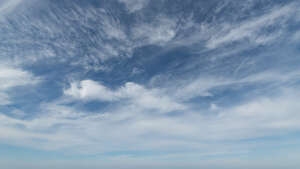 blue sky with thin white clouds