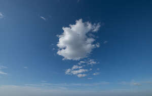 blue sky with one white cloud