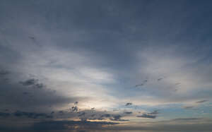 late evening sky with thin layer of clouds