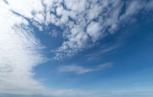 daytime sky with thin white clouds