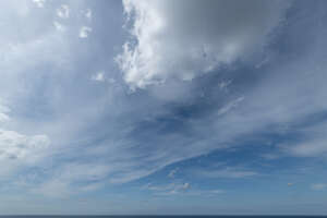daytime sky thinly covered with white clouds
