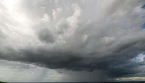 grey sky with a rain cloud