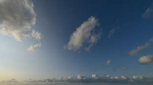 evening sky with cumulus clouds