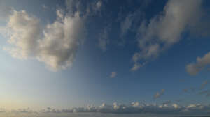 evening sky with cumulus clouds