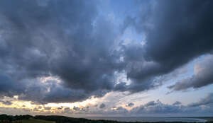 sunset with large dark clouds