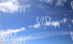 blue daytime sky with some cloud lines