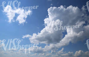 daytime sky with cumulus clouds