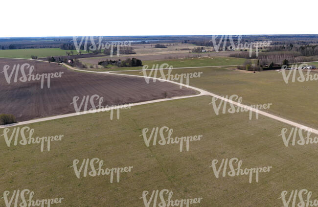 countryside with fields and houses seen from above