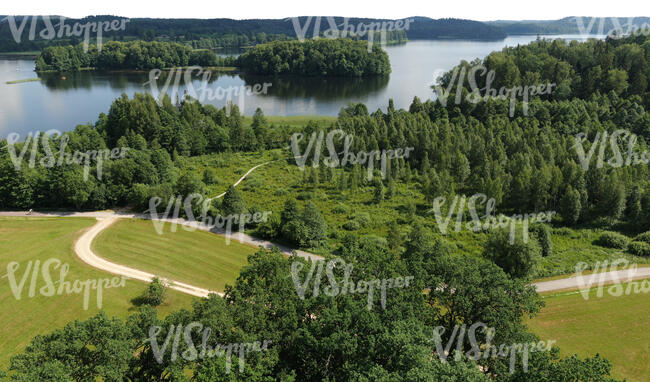 cut out bird eye view of a beautiful rural landscape with a lake