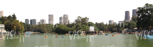 pond with a big city in the background