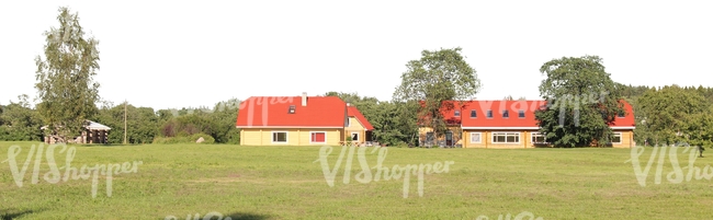 lawn with two houses in the background