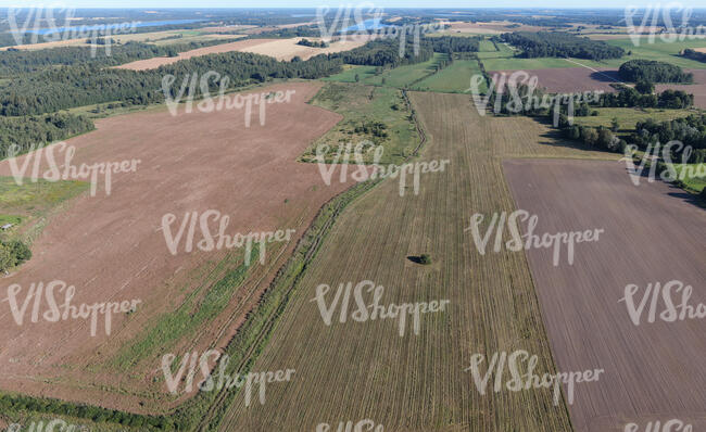 aerial view of a landscape with agricultural fields
