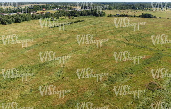 aerial view of large meadow in countryside