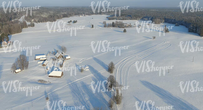 aerial view of a snowy rural landscape 