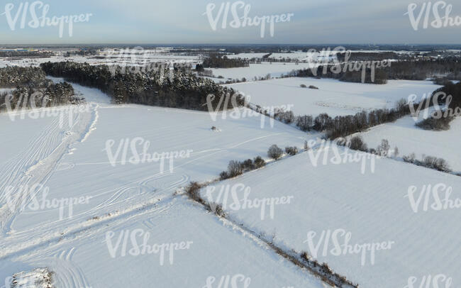aerial view of snow covered fields