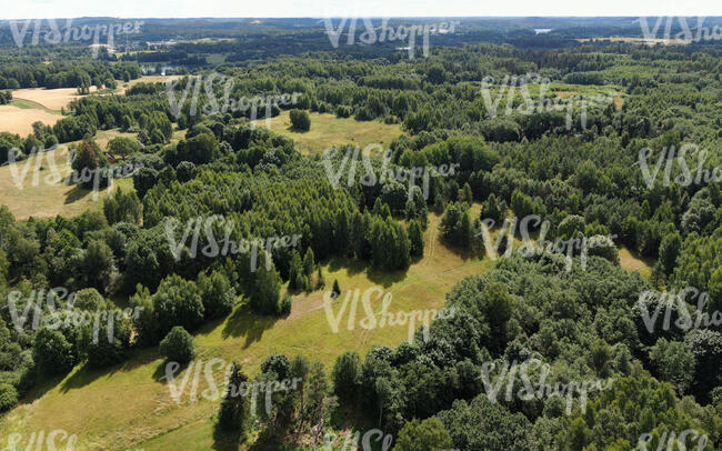 aerial view of forests and fields