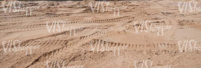 sand with tyre tracks