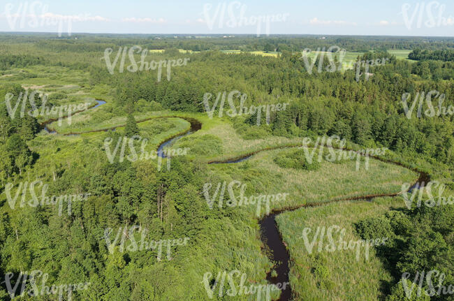 aerial view of a river flowing in countryside