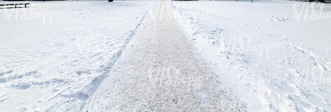 footpath in winter covered with snow