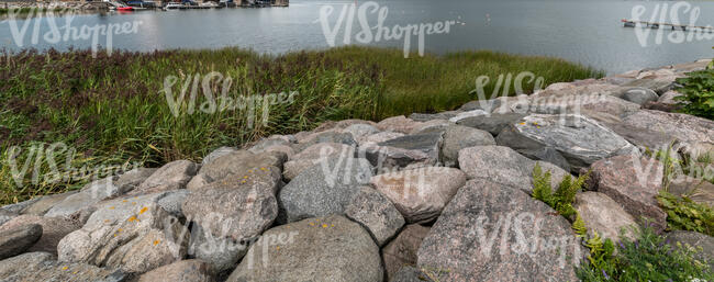 pile of rocks on the shore