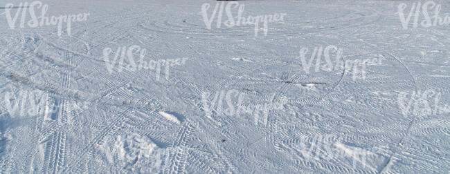 snowy field with different tracks