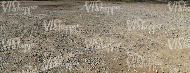 gravel field in sunlight