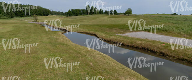 small creek on a golf field