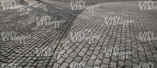 paved square with tree shadows