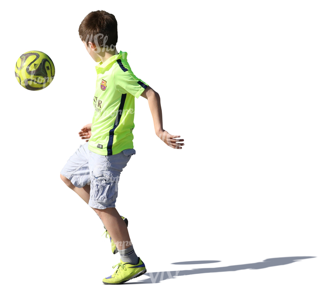 young boy playing with a ball
