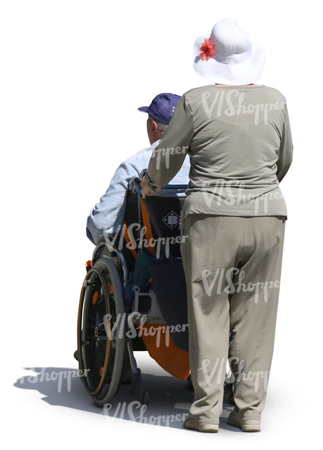 elderly woman pushing a man in a wheelchair