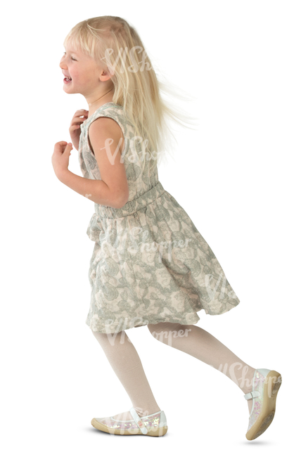 young blonde girl in a party dress running around merrily